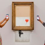 Banksy's Famous Painting Self-Destructs Live
